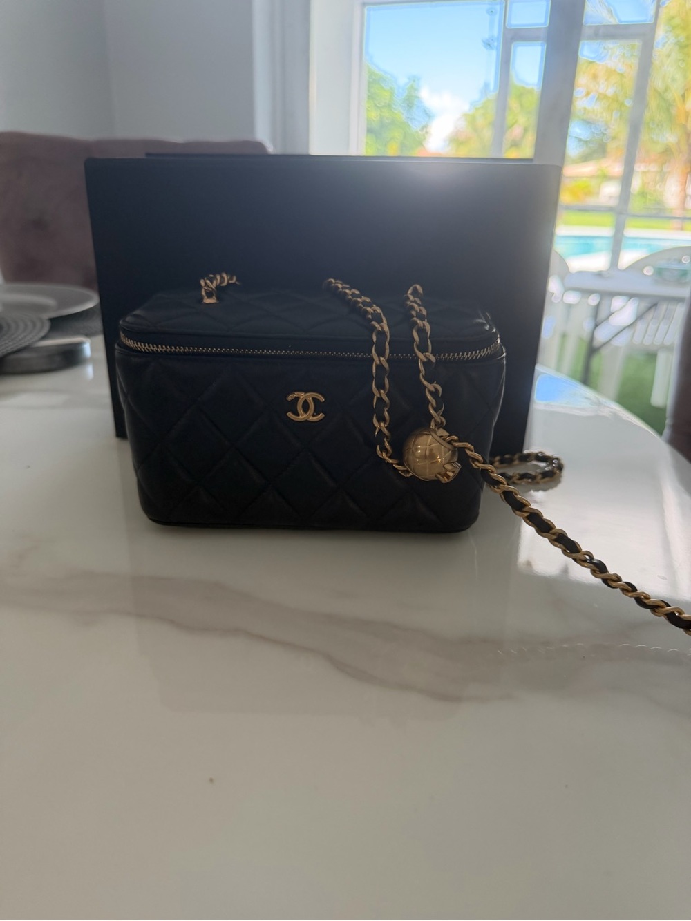 CHANEL Black Quilted Vanity Crossbody with Gold Chain and CC Logo